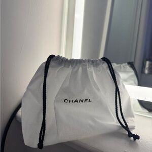 CHANEL White Pouch with Black Drawstrings